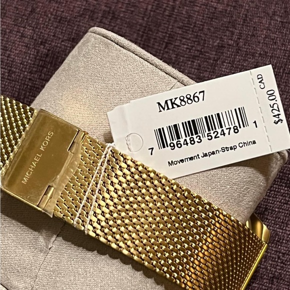 Kors Men’s Oversized Brecken Gold-Tone Mesh Watch
Case Size: 45mm - Picture 9 of 10